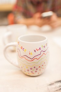Here is Juan's mug, it says "Peace is the pursuit of happiness in life" We agree.